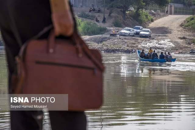 خوزستان زرخیز و گذر سخت مردم عنافچه از رودخانه و پُلی که نیست...